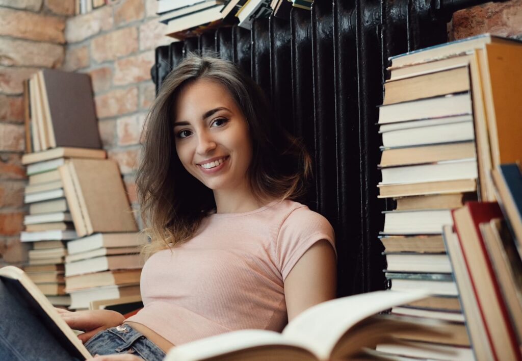 Woman reading a book at home